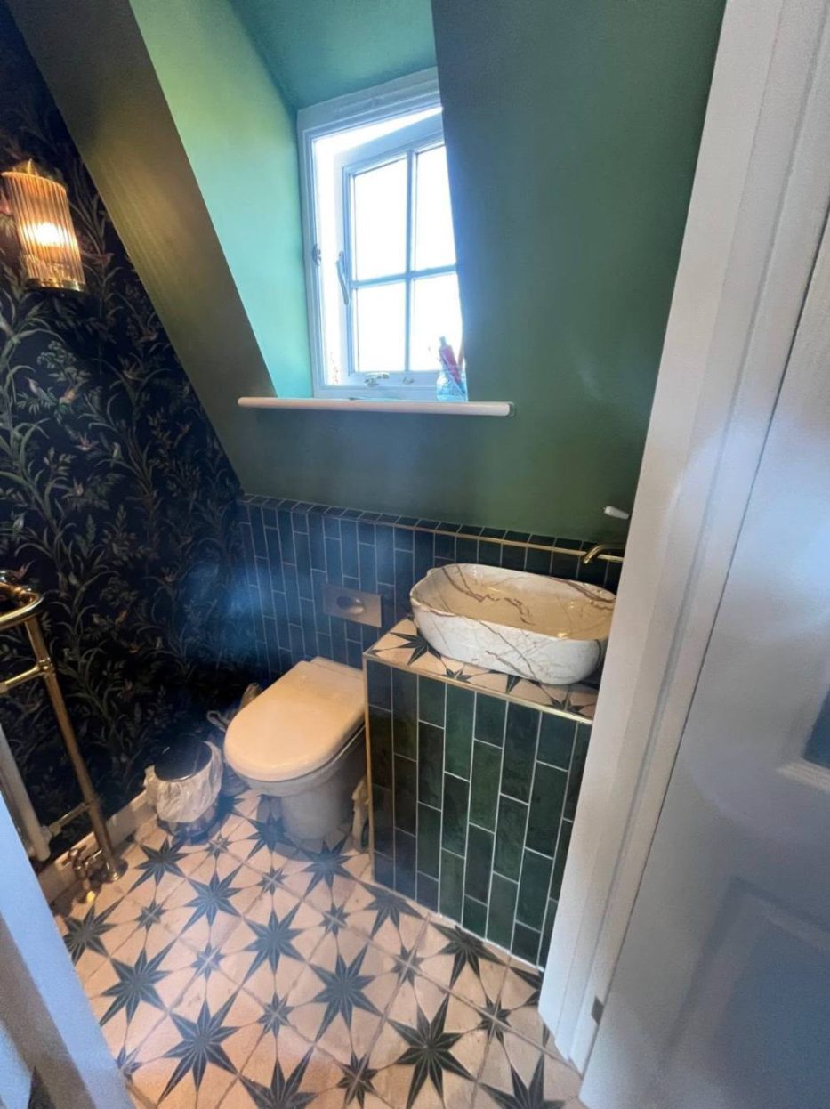 Cloakroom with star pattern floor tiles